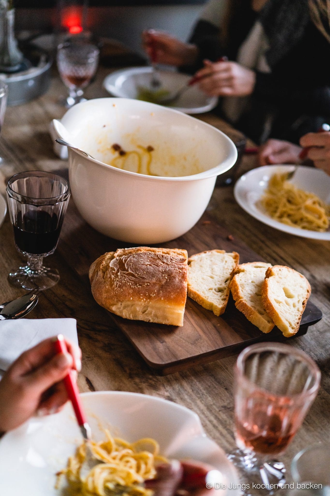 a table with food and glasses